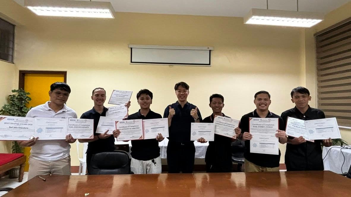 KOICA trainees holding certificates